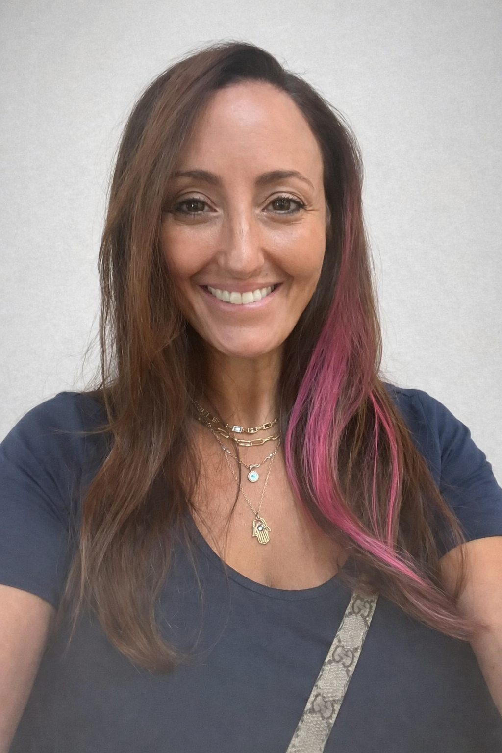 Brunette base with a vibrant pink panel. Bold accent color seamlessly blended.
